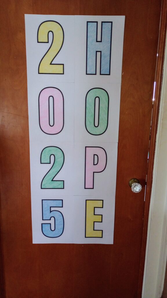 DIY NYE hope banner posted on door