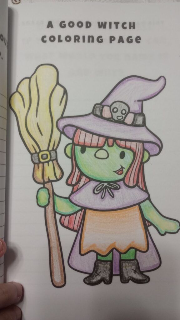 Adorable witch with broom coloring page